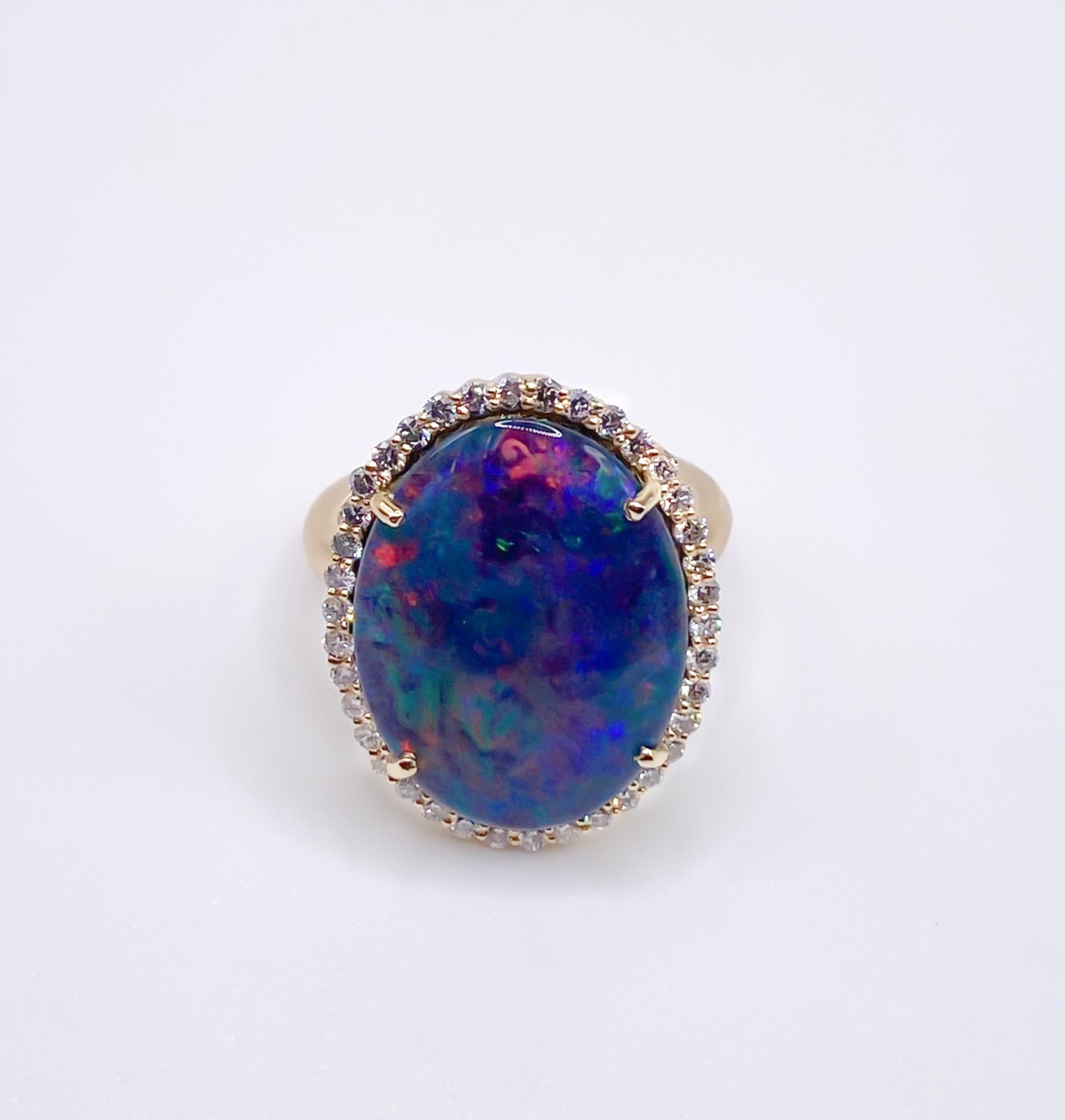 Opal and Diamond Halo Ring