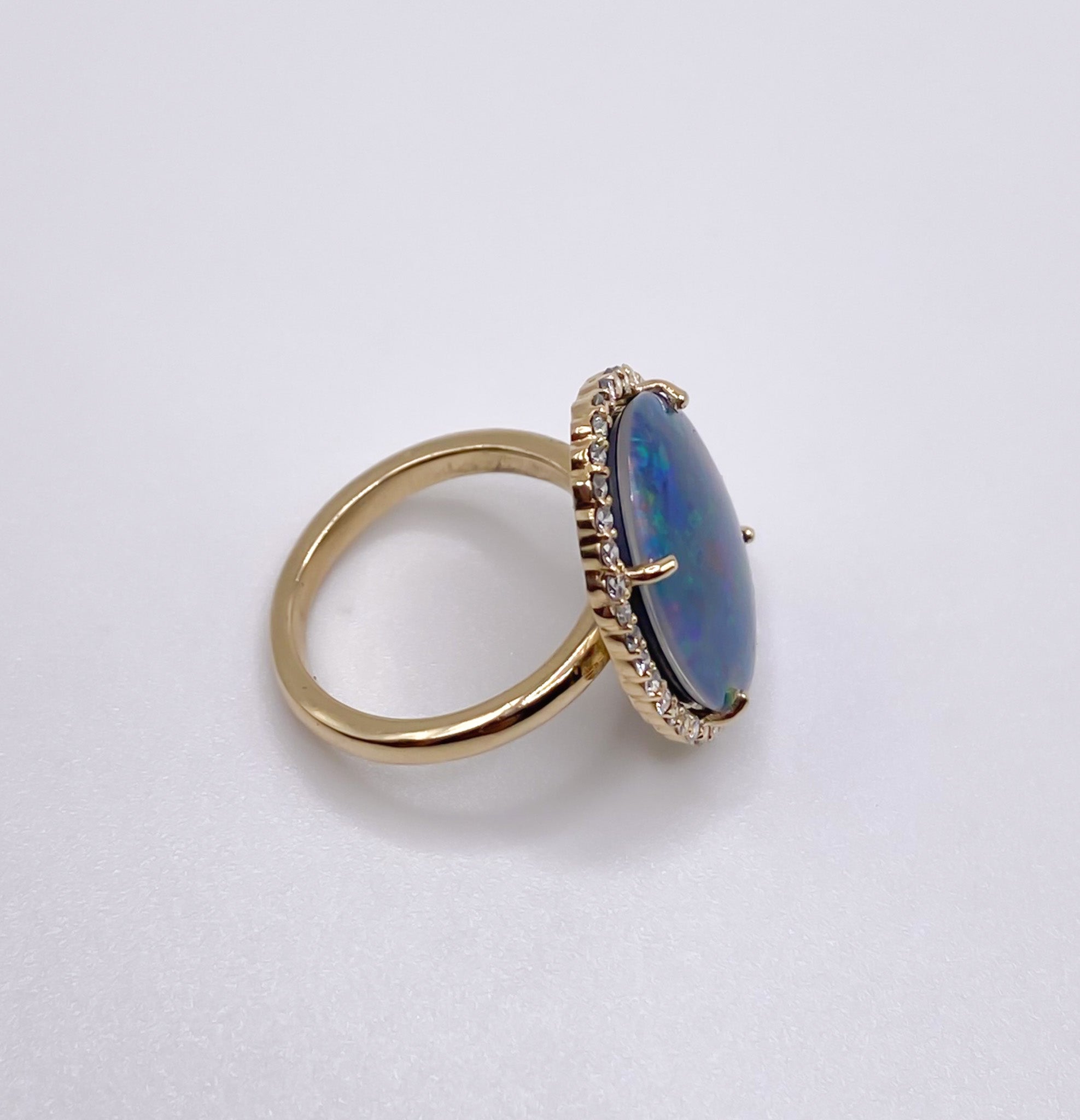 Opal and Diamond Halo Ring