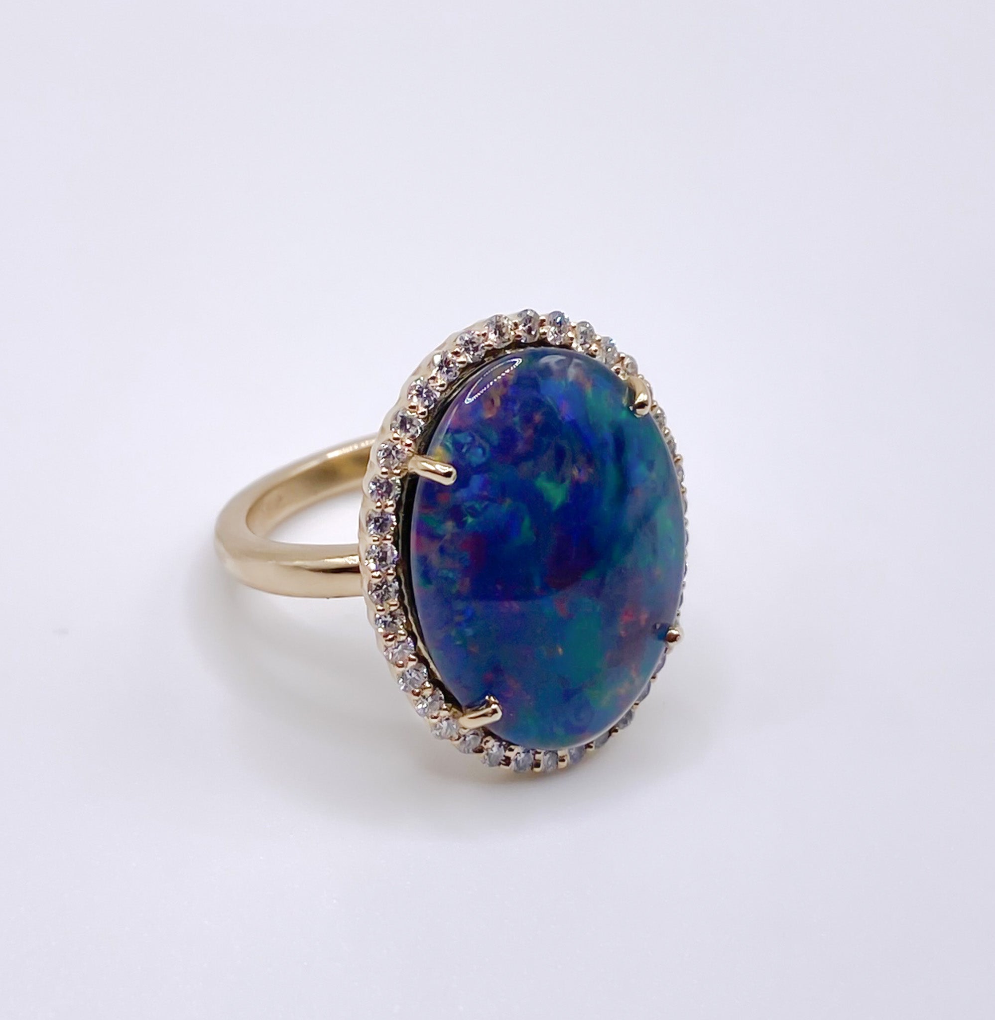 Opal and Diamond Halo Ring